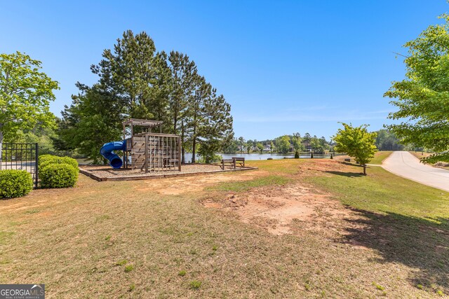517 Lago Ct, Lagrange, GA 30241 - view of yard featuring playground community, fence, and a water view