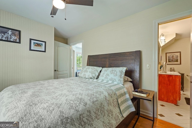 600 Shore Edge Trc, Saint Simons, GA 31522 - bedroom with wood finished floors and ceiling fan