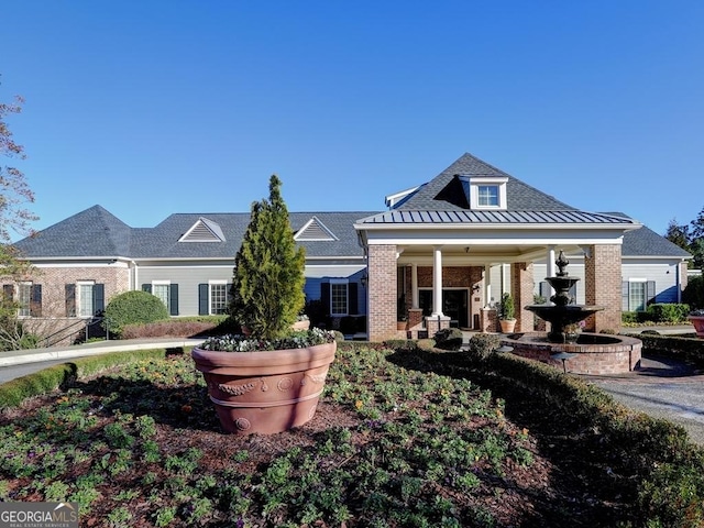 craftsman inspired home with brick siding