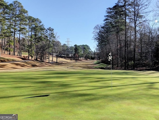 view of home's community with view of golf course