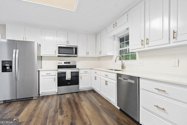 499 Old Deer Path Way, Cleveland, GA 30528 - kitchen featuring a sink, stainless steel appliances, light countertops, white cabinets, and dark wood finished floors