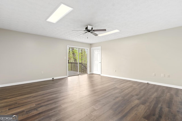 499 Old Deer Path Way, Cleveland, GA 30528 - unfurnished room featuring dark wood-type flooring, a ceiling fan, and baseboards