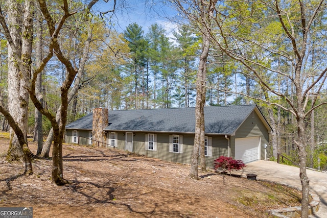 499 Old Deer Path Way, Cleveland, GA 30528 - ranch-style house with a garage, a chimney, a shingled roof, and concrete driveway