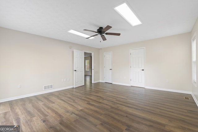 499 Old Deer Path Way, Cleveland, GA 30528 - spare room with baseboards, visible vents, a ceiling fan, and dark wood-type flooring