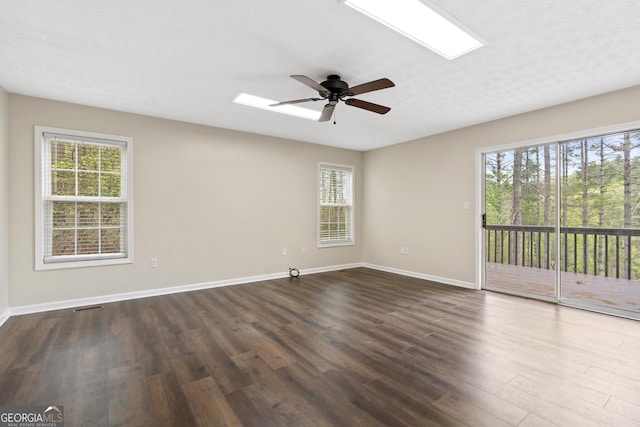 499 Old Deer Path Way, Cleveland, GA 30528 - spare room with baseboards, visible vents, a ceiling fan, and dark wood-style flooring