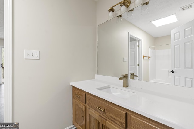 499 Old Deer Path Way, Cleveland, GA 30528 - full bath featuring a shower, visible vents, vanity, and baseboards