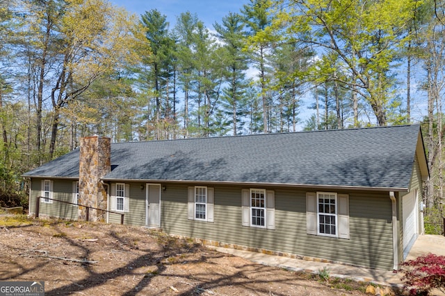 499 Old Deer Path Way, Cleveland, GA 30528 - back of property featuring roof with shingles and a chimney