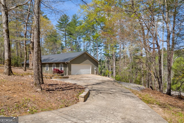 499 Old Deer Path Way, Cleveland, GA 30528 - view of side of home with an attached garage and aphalt driveway