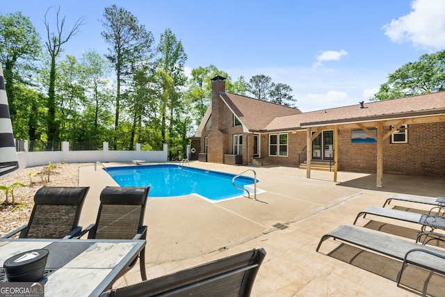 view of pool featuring fence, a patio, and a fenced in pool