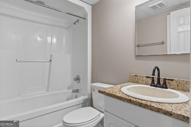 full bath with shower / bathtub combination, visible vents, vanity, and toilet