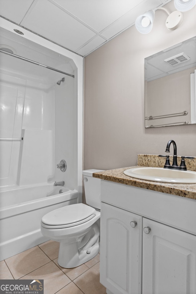 bathroom featuring tile patterned flooring, visible vents, toilet, vanity, and  shower combination