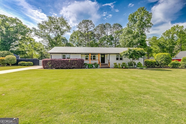 17 Spring Cir, Watkinsville, GA 30677 - single story home featuring metal roof, concrete driveway, stucco siding, and a porch