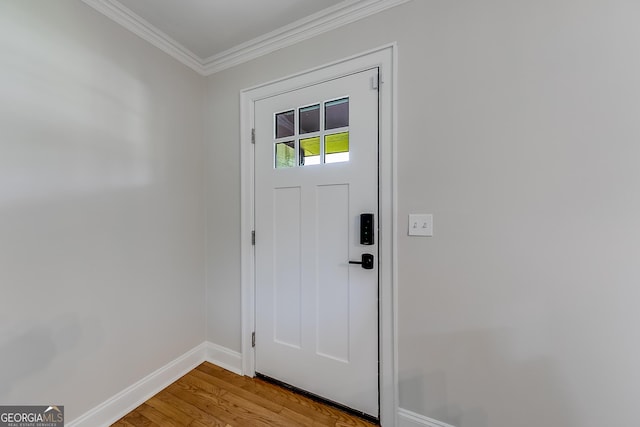 17 Spring Cir, Watkinsville, GA 30677 - doorway to outside featuring baseboards, light wood-style floors, and crown molding