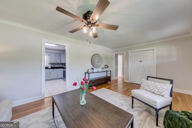 17 Spring Cir, Watkinsville, GA 30677 - living area with ceiling fan, ornamental molding, light wood finished floors, and baseboards