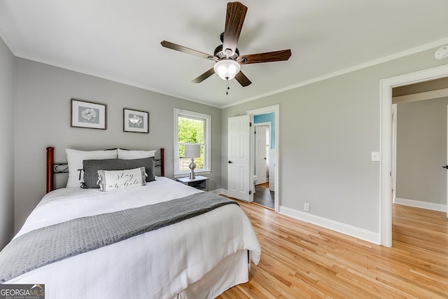 17 Spring Cir, Watkinsville, GA 30677 - bedroom featuring light wood-style floors, baseboards, ornamental molding, and ceiling fan