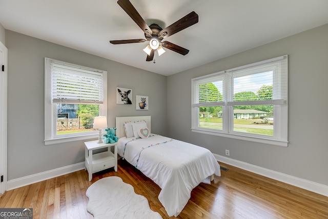 17 Spring Cir, Watkinsville, GA 30677 - bedroom with baseboards, wood finished floors, and ceiling fan