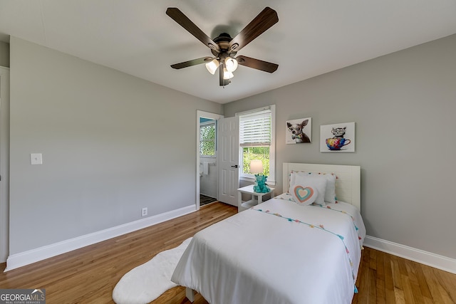 17 Spring Cir, Watkinsville, GA 30677 - bedroom featuring baseboards, wood finished floors, and a ceiling fan