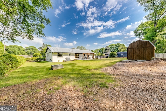 17 Spring Cir, Watkinsville, GA 30677 - view of green lawn with central AC and a patio