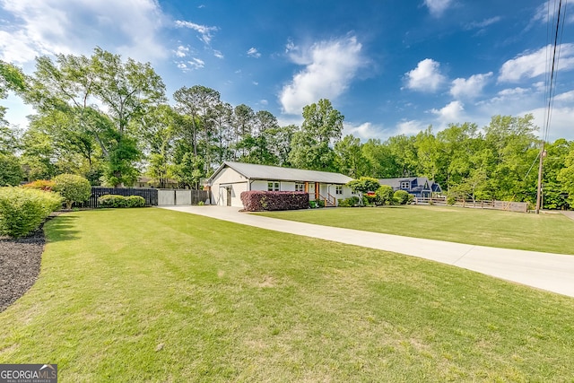 17 Spring Cir, Watkinsville, GA 30677 - ranch-style home featuring a garage and view of wooded area