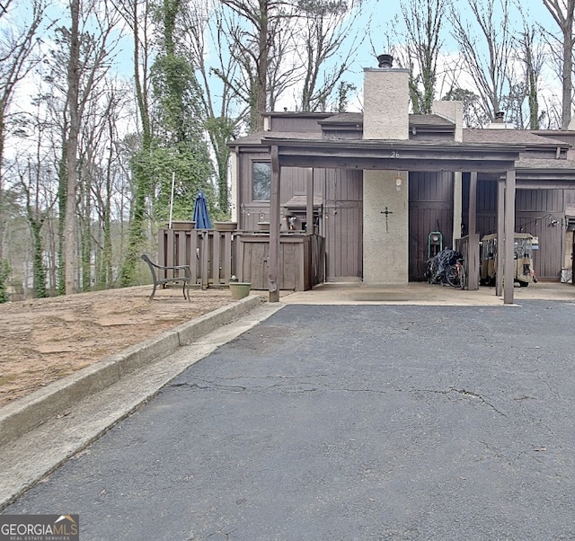 rear view of house with a chimney