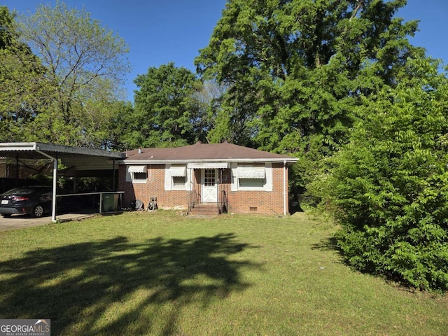 view of front of property with a detached carport, a front lawn, brick siding, entry steps, and crawl space