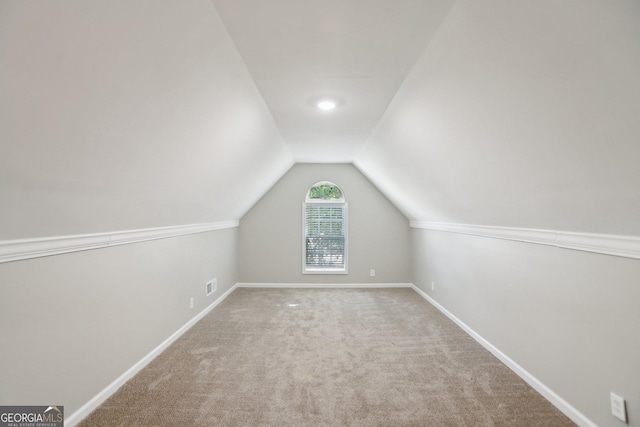 1945 Grayson Oaks Ct, Lawrenceville, GA 30045 - bonus room featuring visible vents, carpet flooring, baseboards, and lofted ceiling