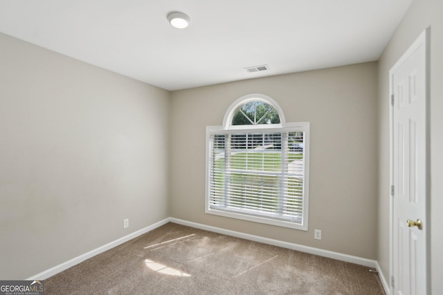 1945 Grayson Oaks Ct, Lawrenceville, GA 30045 - carpeted spare room featuring baseboards and visible vents