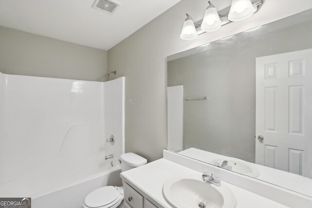 1945 Grayson Oaks Ct, Lawrenceville, GA 30045 - full bathroom with toilet,  shower combination, visible vents, and vanity