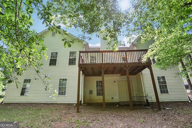 1945 Grayson Oaks Ct, Lawrenceville, GA 30045 - back of property with a wooden deck