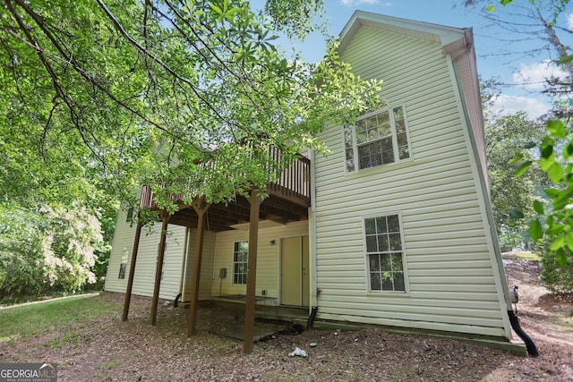 1945 Grayson Oaks Ct, Lawrenceville, GA 30045 - rear view of house featuring a deck
