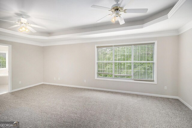 1085 Crown River Pkwy, Mcdonough, GA 30252 - unfurnished living room featuring a premium fireplace, baseboards, ceiling fan, and carpet