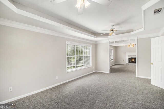 1085 Crown River Pkwy, Mcdonough, GA 30252 - unfurnished living room featuring ceiling fan, carpet flooring, baseboards, and a high end fireplace