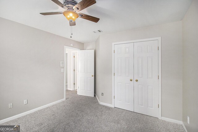 1085 Crown River Pkwy, Mcdonough, GA 30252 - unfurnished living room featuring baseboards, a paneled ceiling, recessed lighting, and carpet