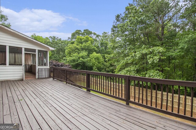 1085 Crown River Pkwy, Mcdonough, GA 30252 - back of house with a patio area, brick siding, a yard, a fenced backyard, and a sunroom
