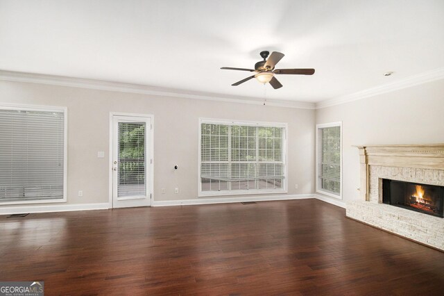 1085 Crown River Pkwy, Mcdonough, GA 30252 - foyer with arched walkways, an inviting chandelier, crown molding, and dark wood-type flooring