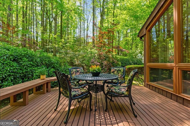 deck featuring outdoor dining space