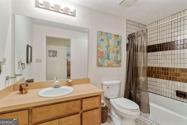 full bath featuring a textured ceiling, vanity, shower / tub combo, toilet, and tile patterned flooring