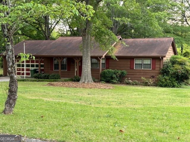 1479 Gloria St, Griffin, GA 30224 - ranch-style home with a front lawn