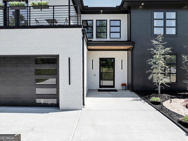 doorway to property with brick siding