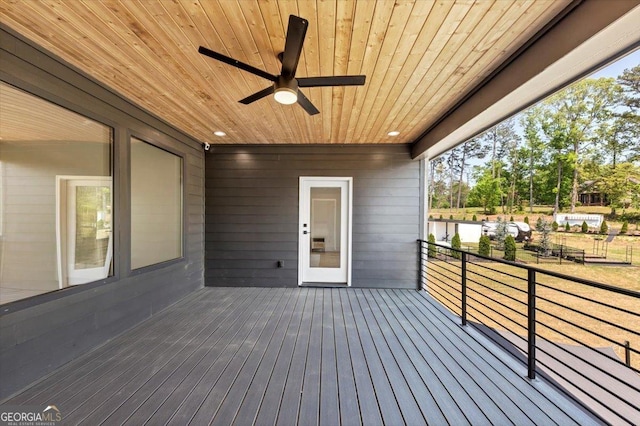 wooden deck with ceiling fan