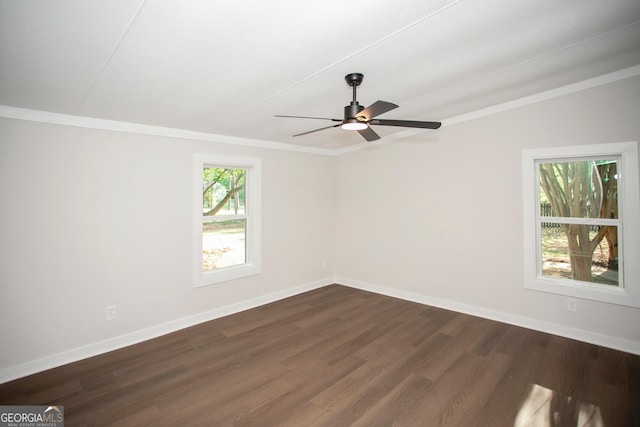 216 Howard Rd, Barnesville, GA 30204 - unfurnished room with dark wood-type flooring, baseboards, a ceiling fan, and ornamental molding