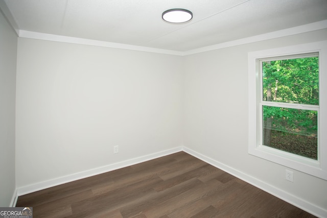 216 Howard Rd, Barnesville, GA 30204 - spare room with dark wood finished floors and baseboards