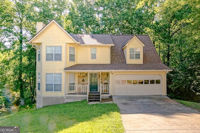 1166 Memory Ln, Lawrenceville, GA 30044 - traditional home featuring a porch, driveway, a chimney, a front lawn, and a shingled roof