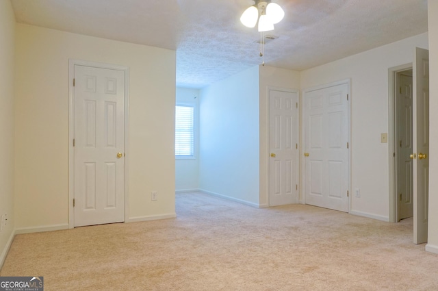 1166 Memory Ln, Lawrenceville, GA 30044 - carpeted empty room featuring baseboards and ceiling fan