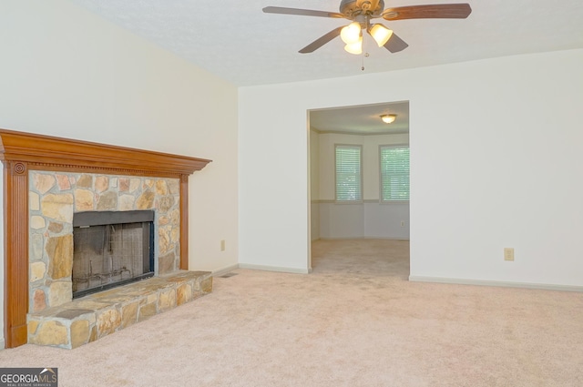 1166 Memory Ln, Lawrenceville, GA 30044 - unfurnished living room with carpet flooring, a fireplace, a ceiling fan, and baseboards