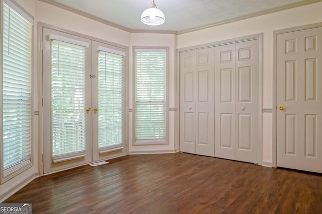 1166 Memory Ln, Lawrenceville, GA 30044 - unfurnished bedroom featuring access to exterior, wood finished floors, crown molding, and multiple windows