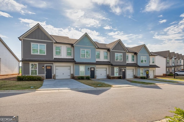 130 Magnolia Pl, Homer, GA 30547 - multi unit property featuring board and batten siding, a garage, a residential view, and driveway