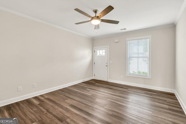 130 Magnolia Pl, Homer, GA 30547 - foyer entrance featuring dark wood-type flooring, ceiling fan, and ornamental molding