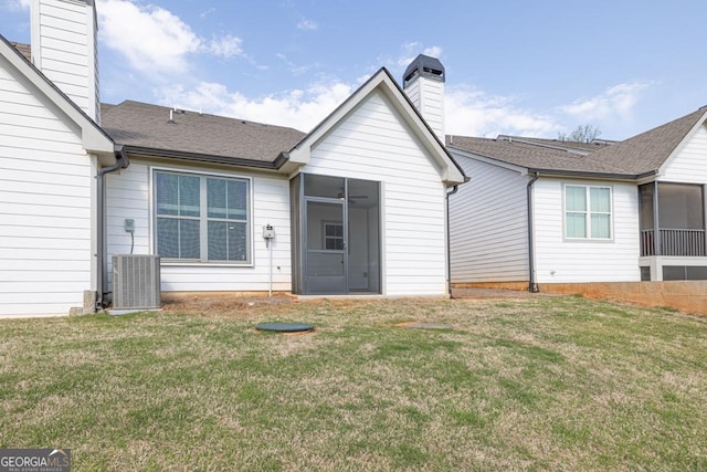130 Magnolia Pl, Homer, GA 30547 - back of property with a chimney, a sunroom, and a lawn