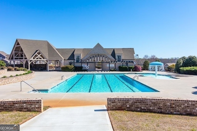 130 Magnolia Pl, Homer, GA 30547 - community pool featuring a patio area